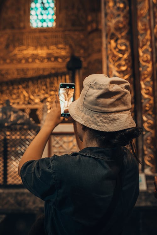 Man Taking a Picture in a Cathedral 