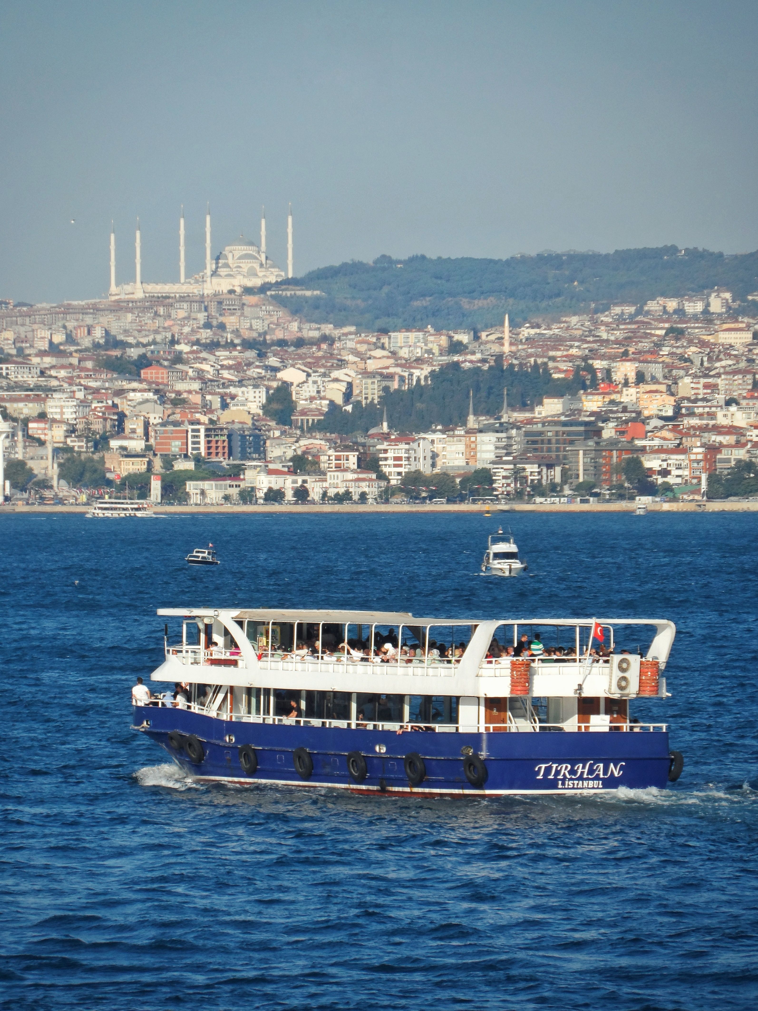 A Ferry on the Bosphorus Strait and View of Istanbul in the Background ...