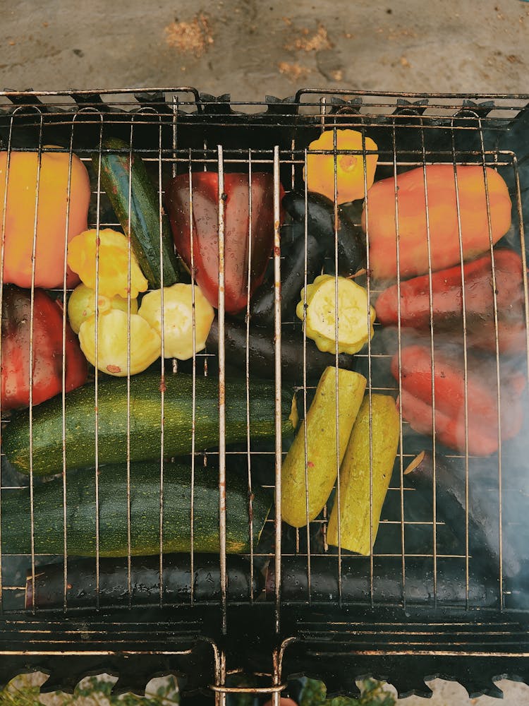 A Bunch Of Vegetables On The Grill 