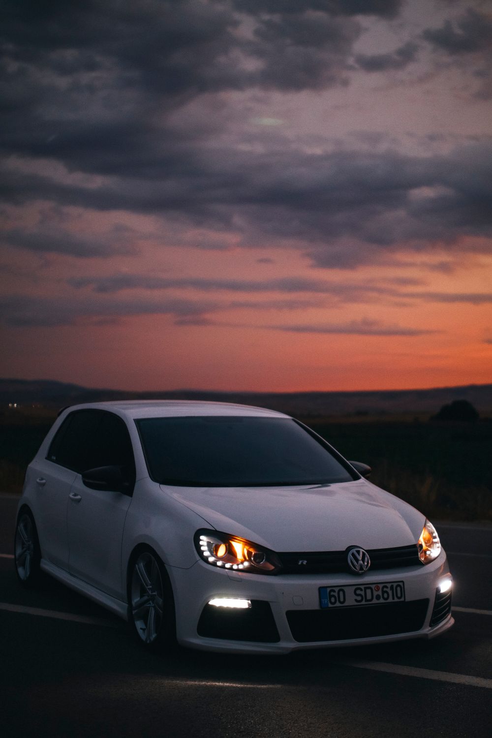 White Volkswagen Golf VI At Sunset Free Stock Photo white-volkswagen-golf-vi-at-sunset-free-stock-photo