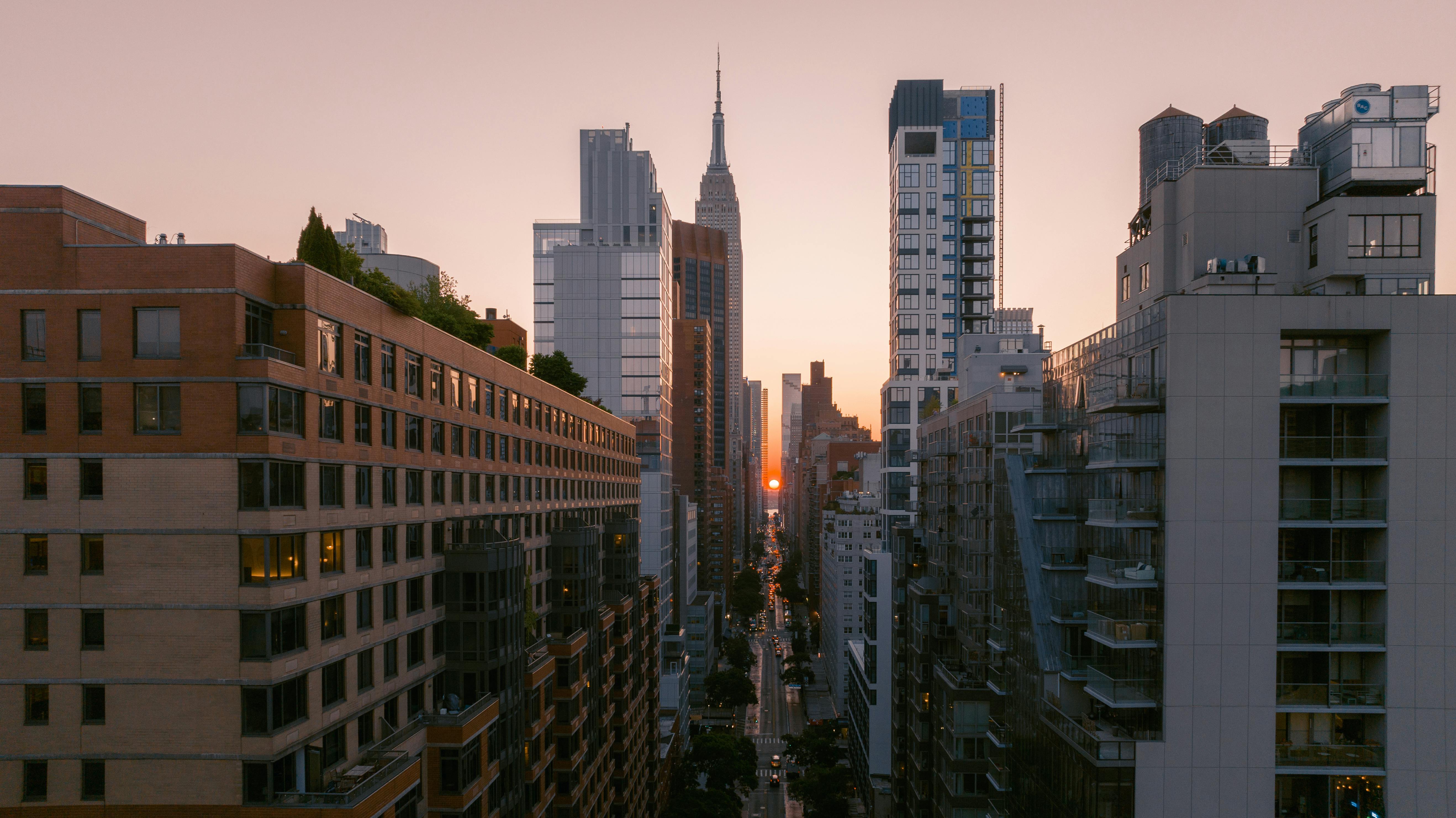 Gangnam evening skyline compared with a Manhattan midtown street at dusk