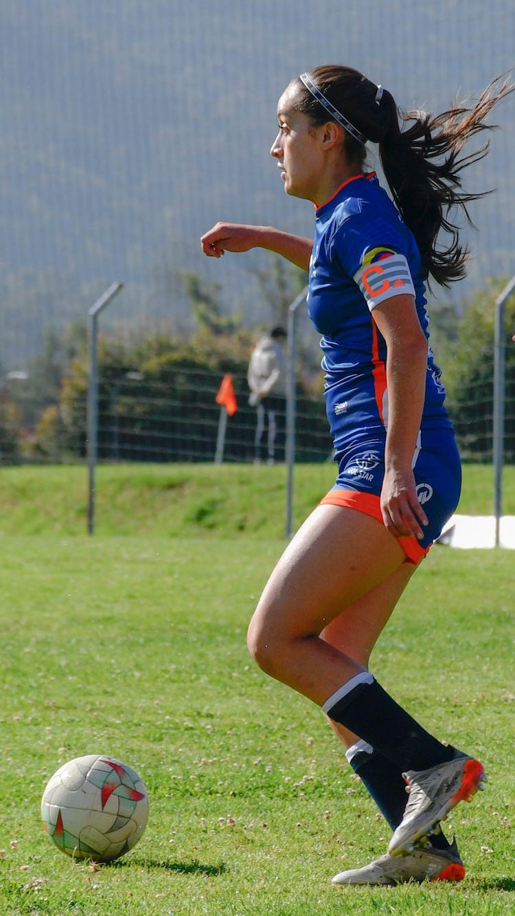 A Woman Playing Soccer 