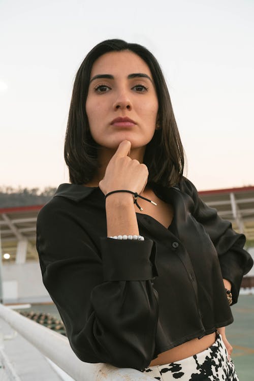 Brunette in Cropped Blouse