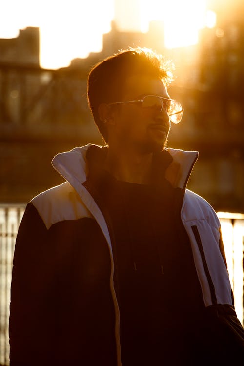 Model in Jacket Posing in Sunset Light