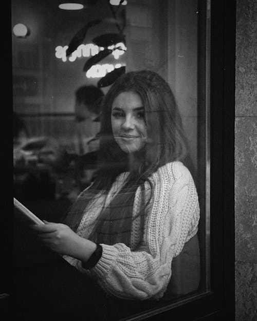 Smiling Woman behind the Window 