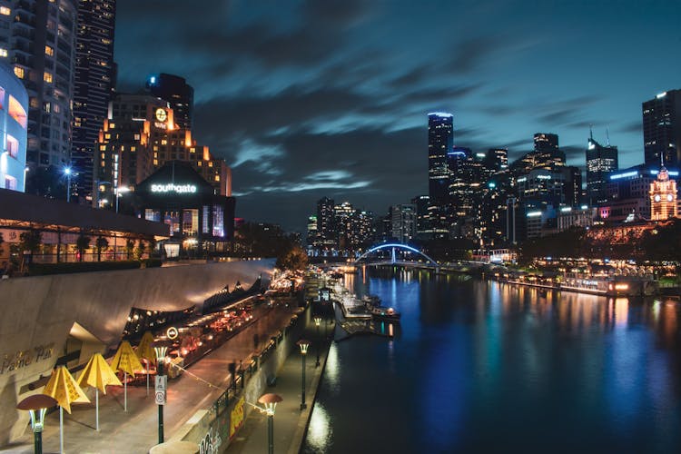 Yarra River Flowing Through Downtown Melbourne At Night