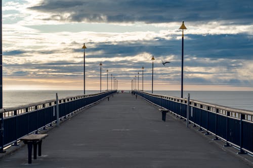 Wooden Pier During Sunset 