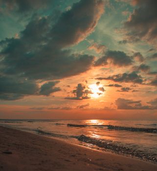 Stunning sunset over Jurmala Beach, capturing the beauty of Latvia's coastline.