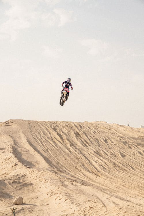 Photo of a Motocross Rider Coming Off a Jump