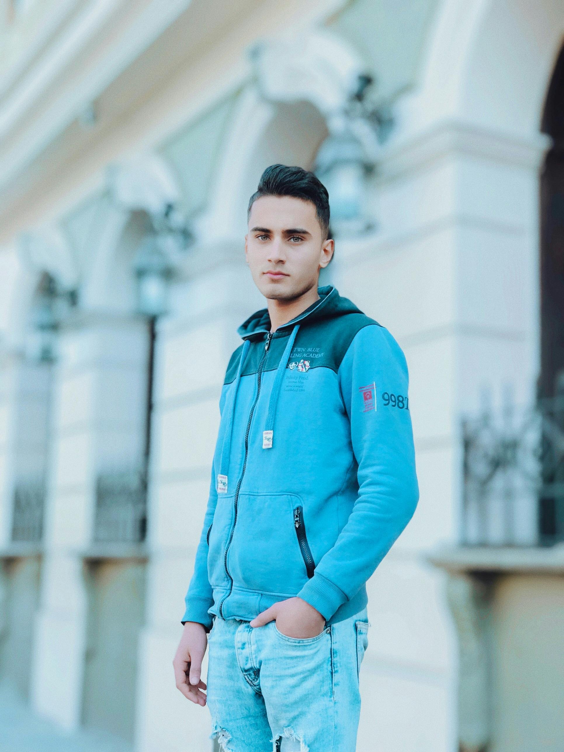 City skyline at dusk with traffic, representing urban noise exposure.