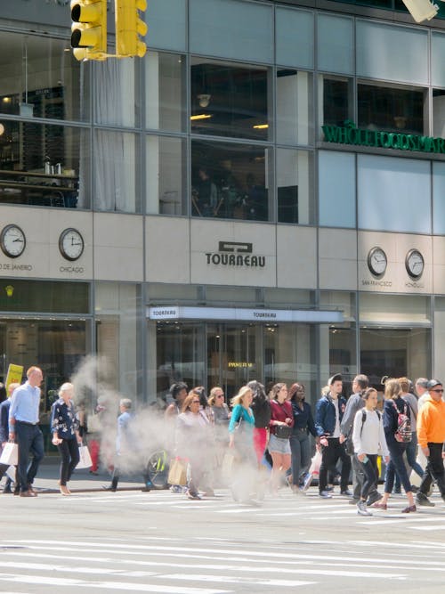 People Crossing Street in City