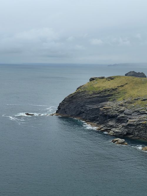 Free Explore the rugged cliffs of Tintagel, England during an overcast day, capturing nature's raw beauty. Stock Photo