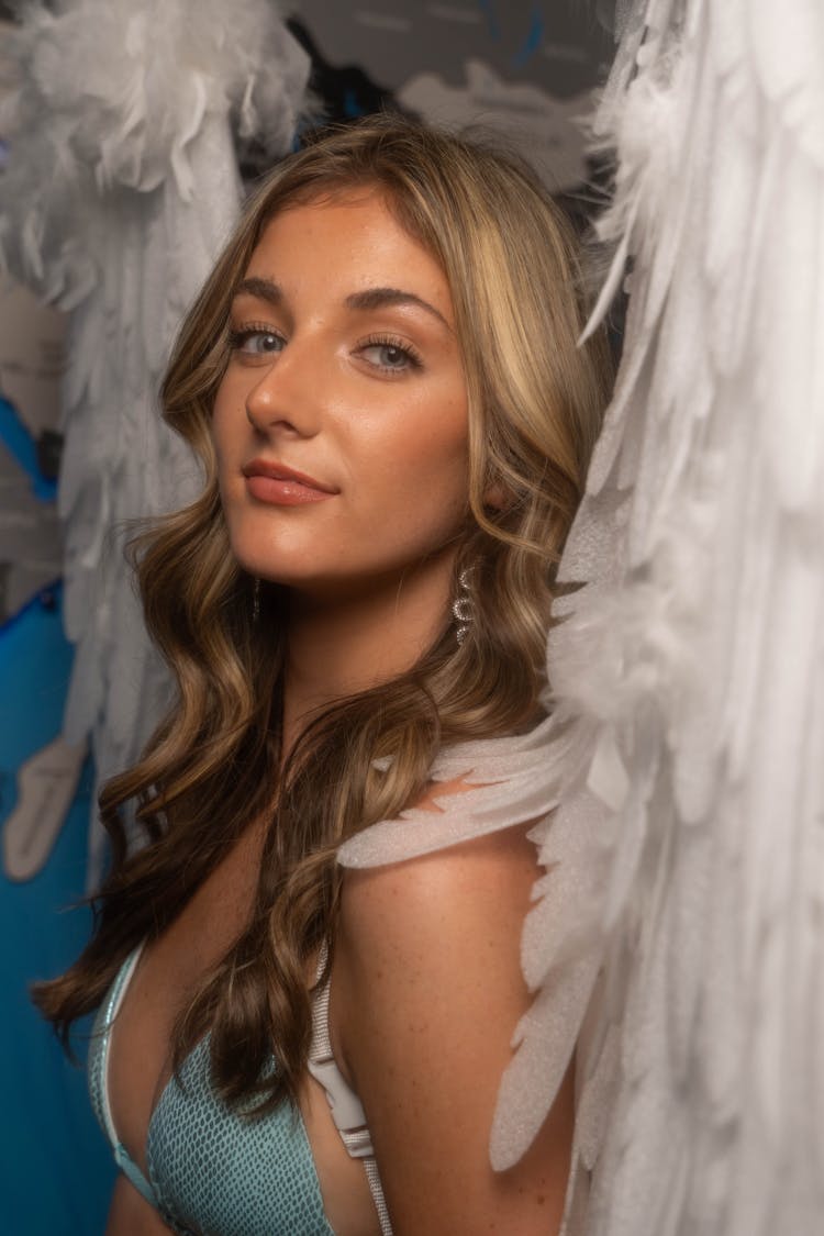 Young Woman Wearing Angel Wings 