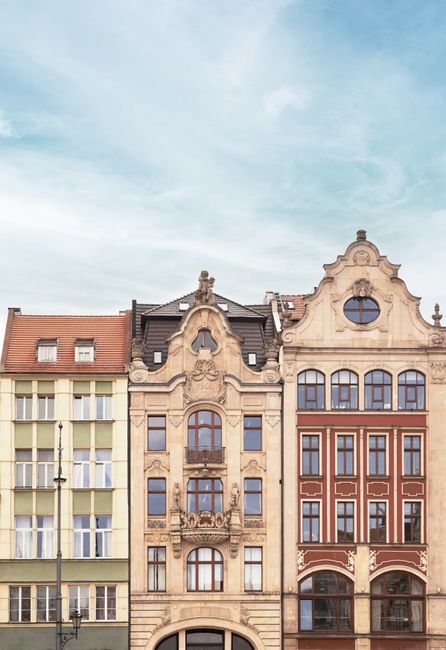 Beautifully preserved historic tenements in Wroc艂aw, Poland, showcasing urban elegance.