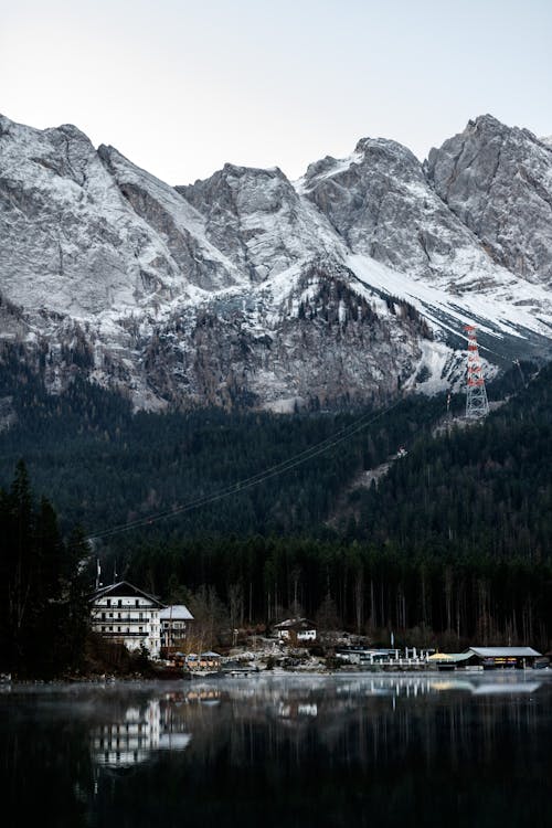 Resort by the Lake at the Foot of the Snowcapped Mountains