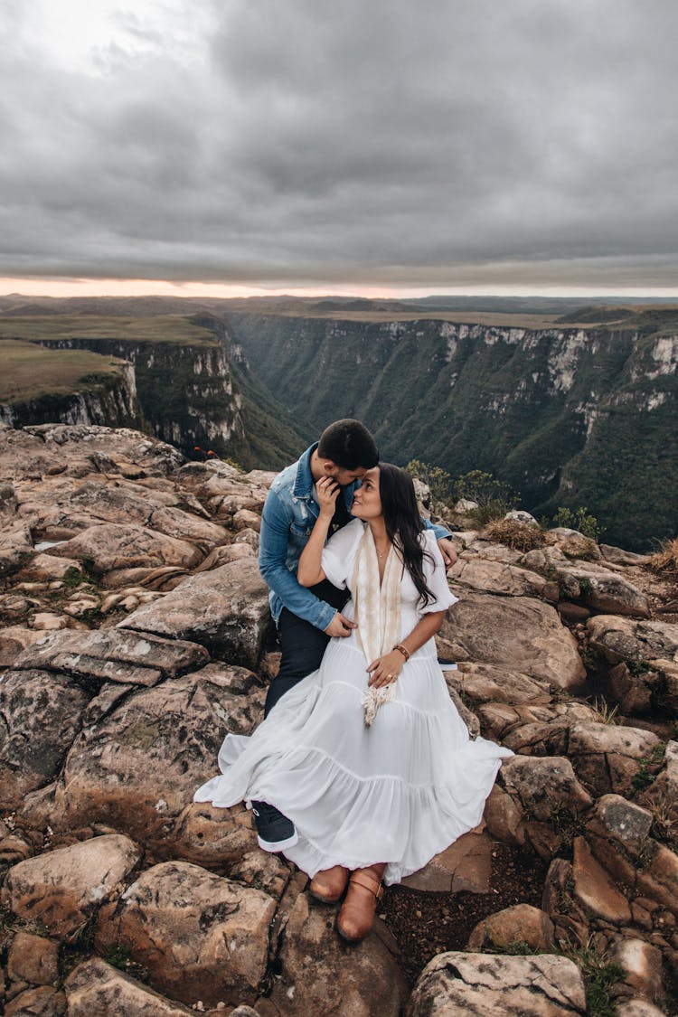 Romantic Couple Embracing At The Canyon Edge