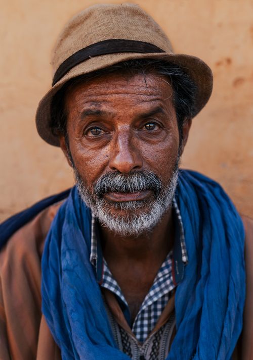 Free Captivating portrait of a Moroccan man in Tazoulte, highlighting cultural attire and expression. Stock Photo