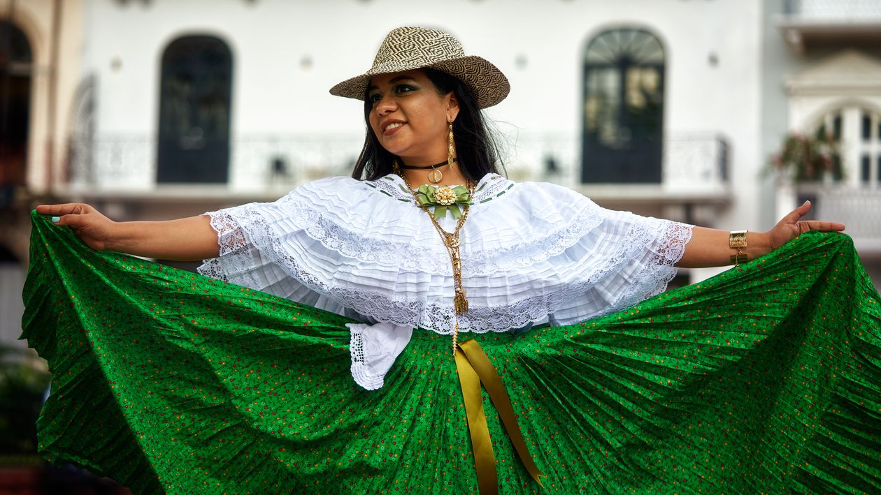 Pollerin Woman in Green Pollera Skirt Dancing in the City Square · Free Stock Photo