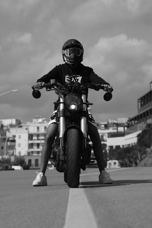 Free Person on Motorbike in Black and White Stock Photo