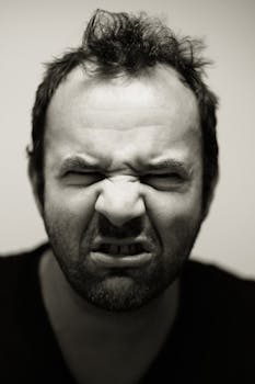 Free stock photo of black-and-white, man, portrait, grimace