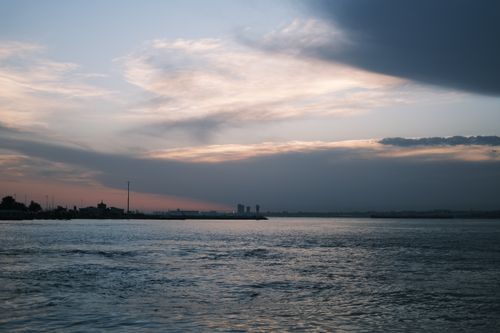 Free Tranquil evening view of Istanbul skyline with cloudscape over the Bosphorus Strait. Stock Photo