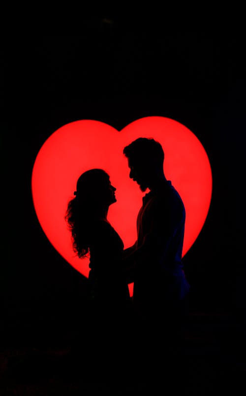 Couple looking each other love background silhouette