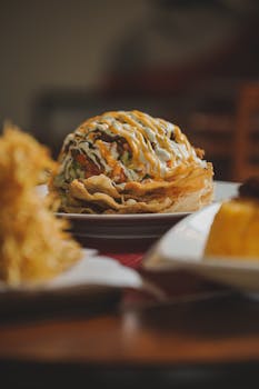 Close-up shot of loaded nachos with sauces and toppings, perfect for a food blog.
