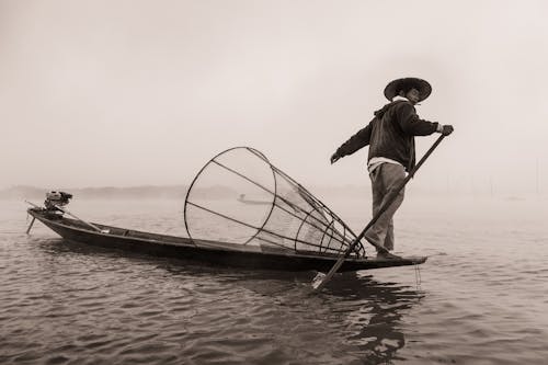 Fisherman on Fishing Boat in Black and White