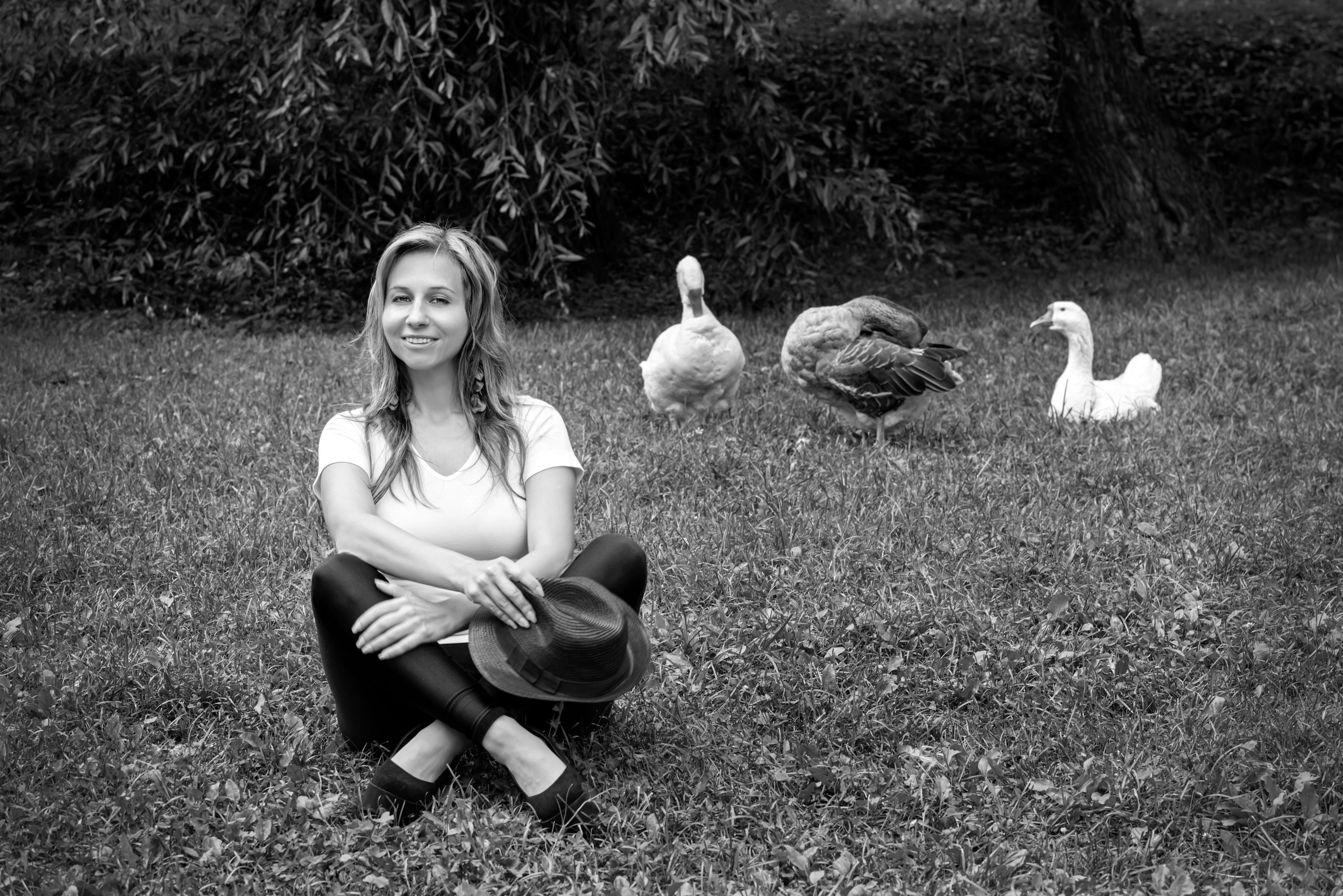 A Woman Sitting on the Ground · Free Stock Photo