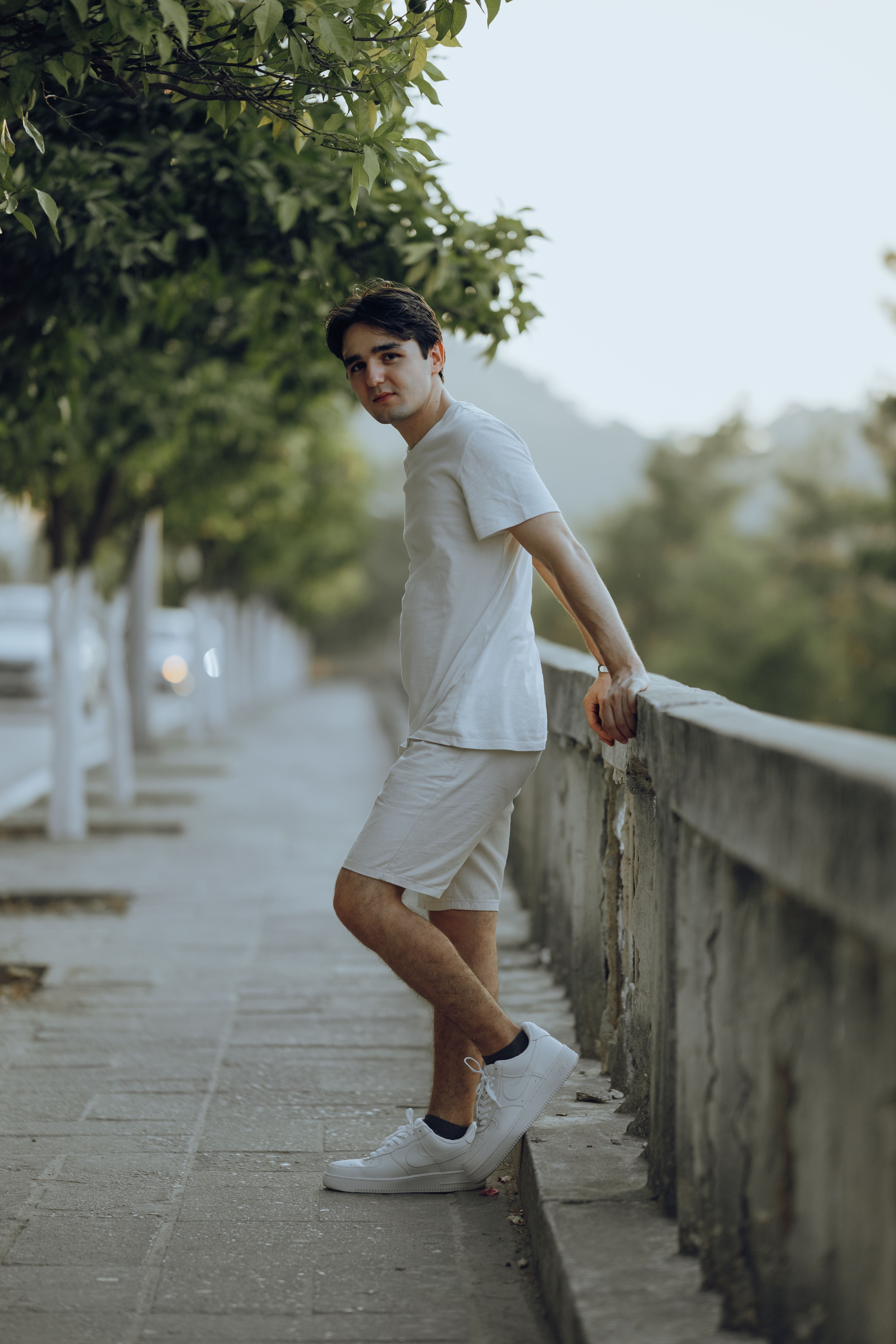 Man in a White T-Shirt and Shorts · Free Stock Photo