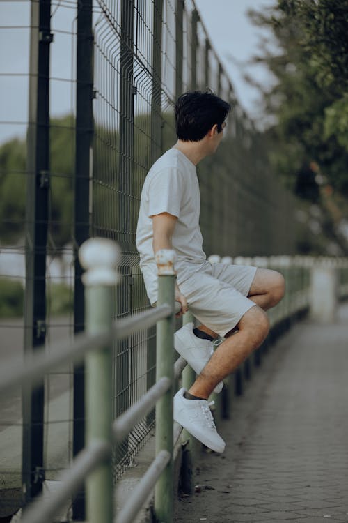 Foto profissional grátis de calção, camiseta, equipamentos esportivos