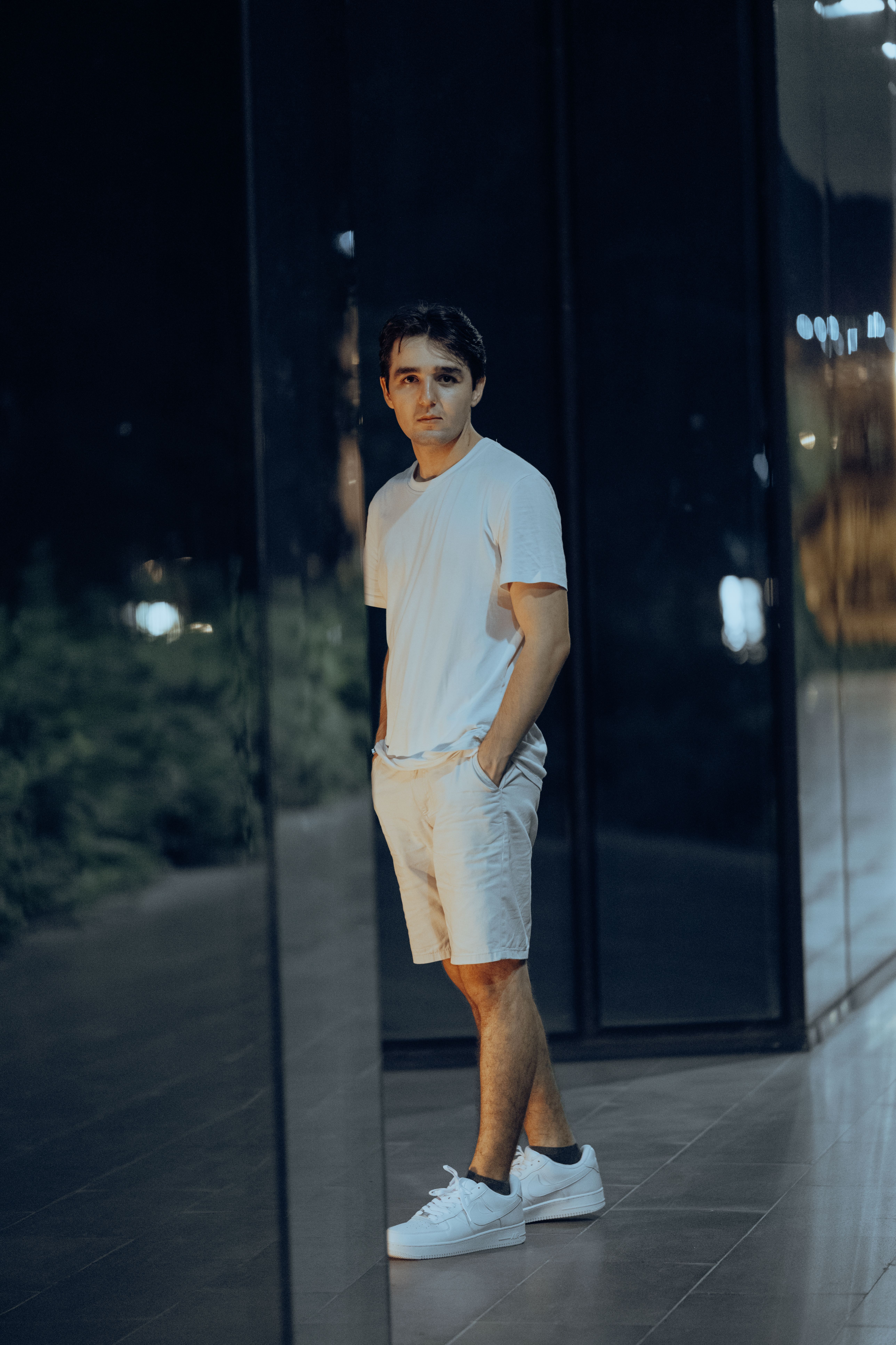 Man in a White T-Shirt and Shorts · Free Stock Photo
