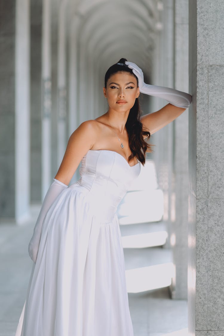 Bride In Wedding Dress And Gloves