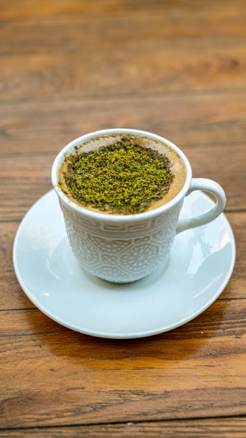 Close-up of a Cup of Turkish Coffee Served with Nuts 