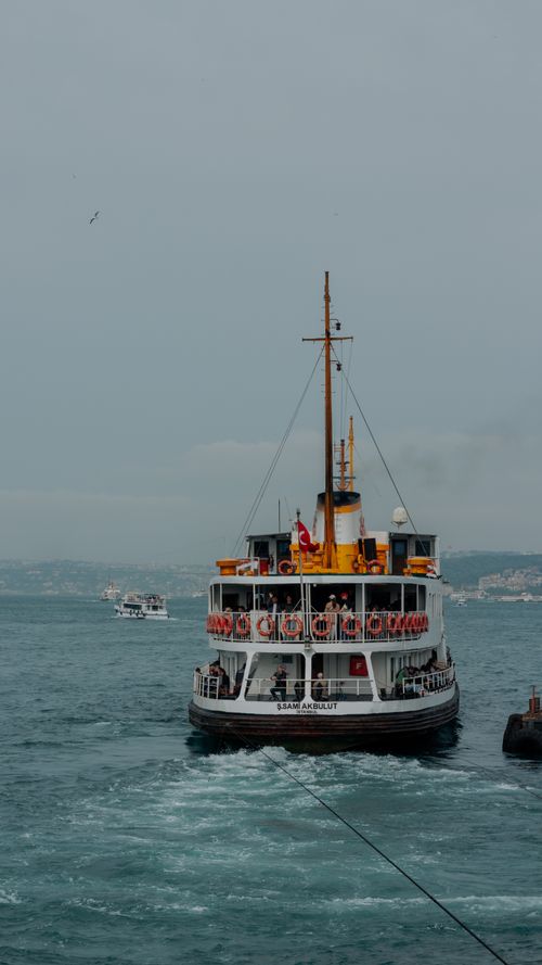 Free A classic ferry navigating the Bosphorus waters in Istanbul, Türkiye, capturing local maritime culture. Stock Photo