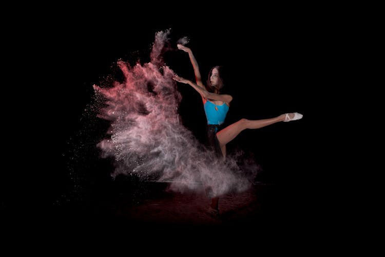 Dancing Woman Throwing Powder In Air