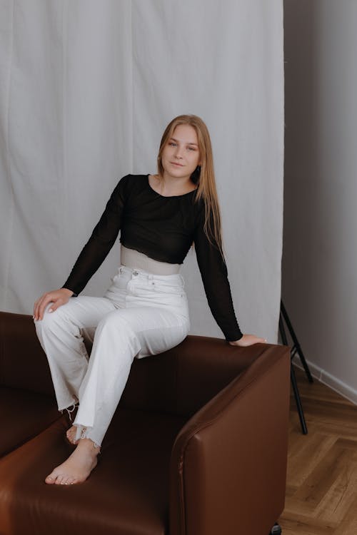 Blonde Woman Posing on Couch