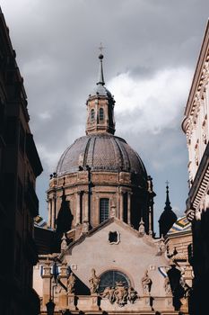 Stunning architectural view of the Basilica del Pilar's dome in Zaragoza, Spain.