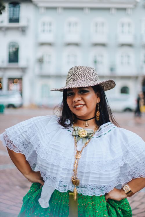 Free A smiling woman in traditional Panamanian attire poses outdoors, showcasing cultural heritage. Stock Photo