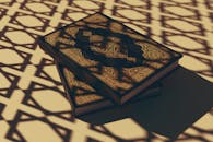 Quran Books in Shadow