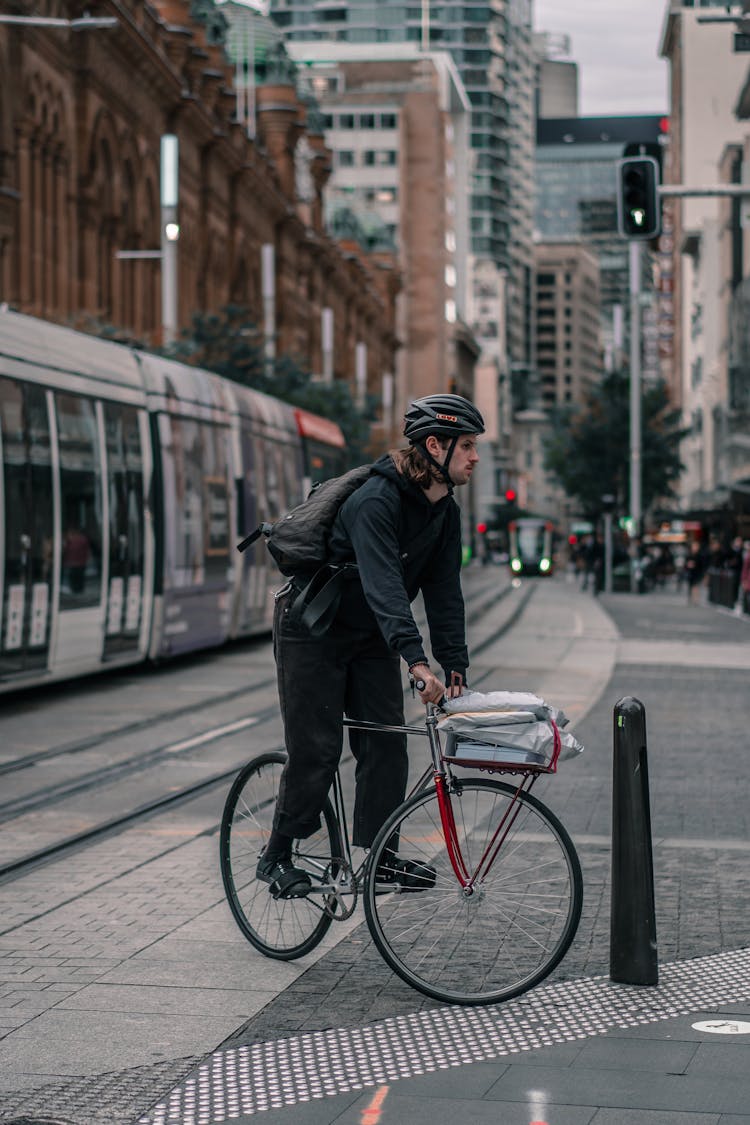 Cyclist In Downtown