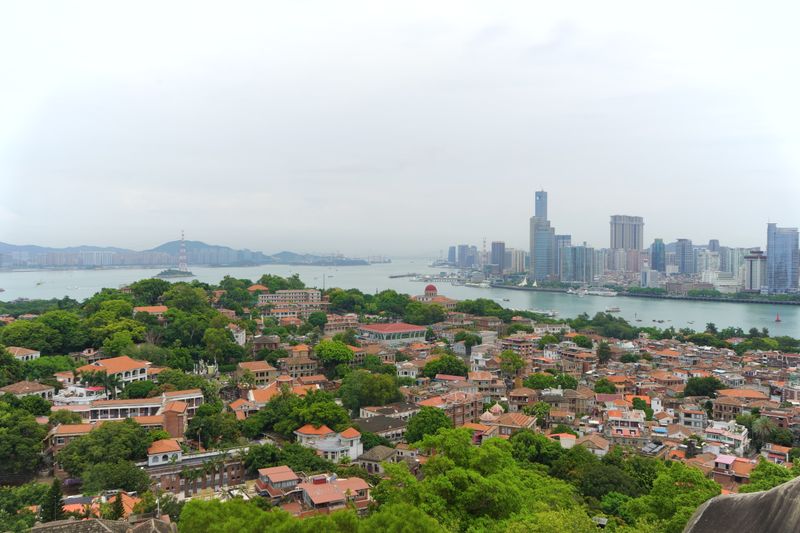 Aerial view of Gulangyu Island with Xiamen city skyline