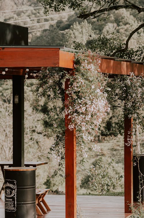 A Patio with a Wooden Roof 