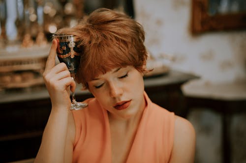 Free Photo of Woman Holding Champagne Glass Stock Photo