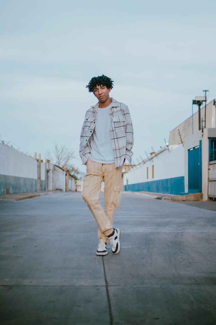 Young Black Man Posing On Street