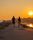 couple walking sunset