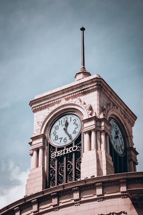 Gratis stockfoto met buitenkant van het gebouw, hemel, horloge