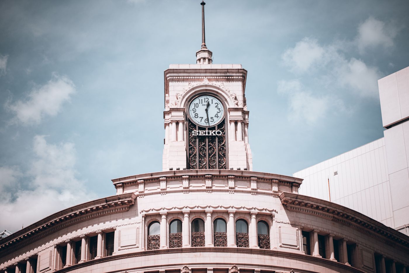 Low-angle view of the Wako clock tower in Ginza, Tokyo