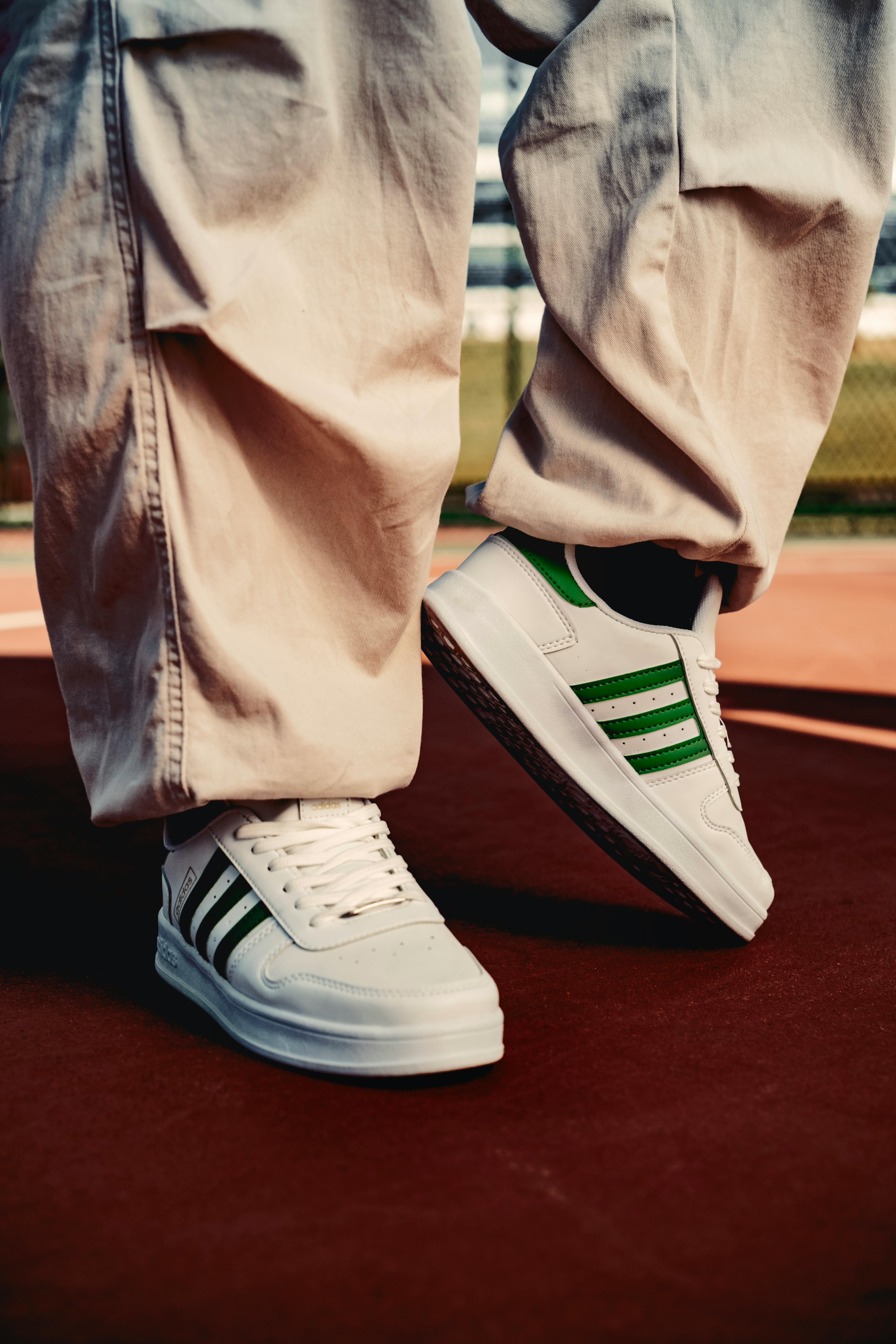 Person Wearing Adidas Yeezy Boost Shoes · Free Stock Photo