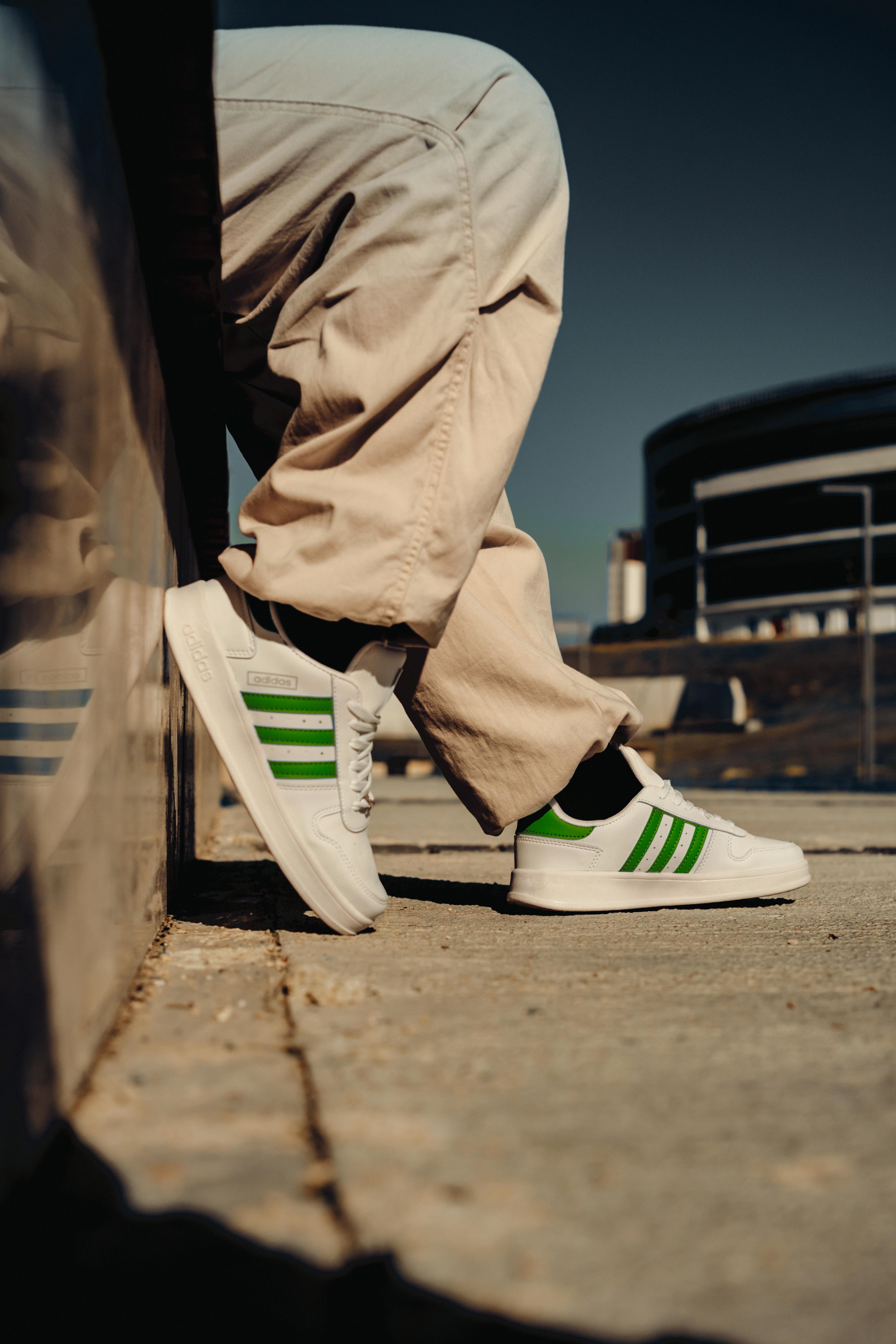 Adidas sneakers with green stripes best sale